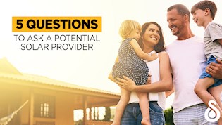 5 questions to ask a potential solar power provider blog post image. With a happy family smiling in the sun.