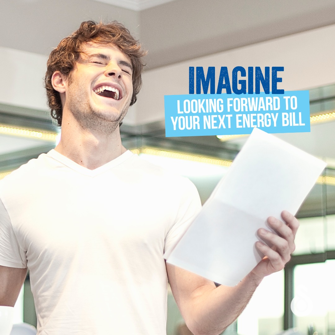 A satisfied Solahart customer laughing at their electricity bill.